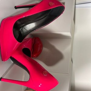 Philipp Plein hot pink stilettos.